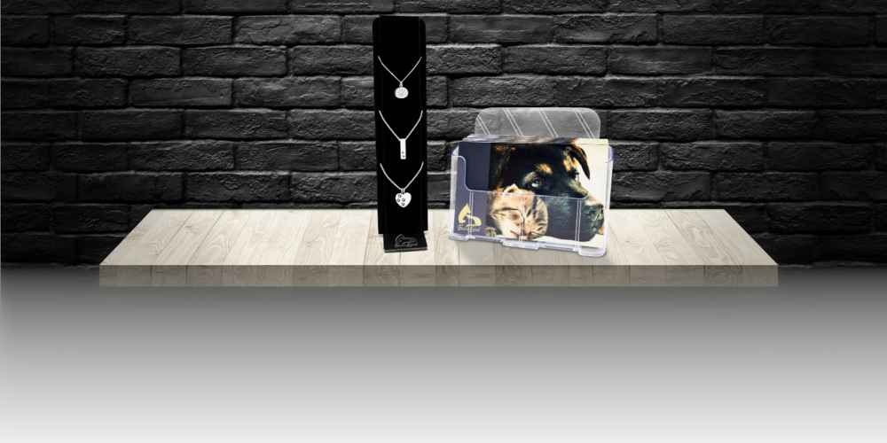 Display of Furever Loved jewelry on a shelf.